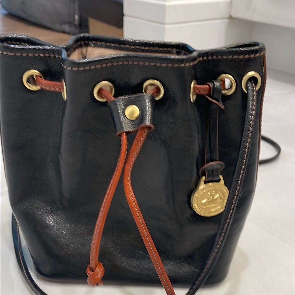 Brahmin Black and Gold Shoulder Bag with Structured Bucket Design